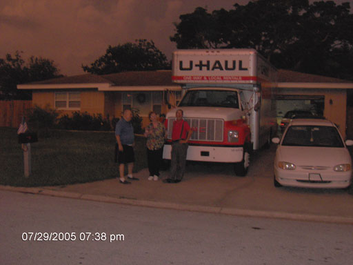 Click here to download a 2048 x 1536 JPG image of Papa Bill, Katie and Tom standing next to the 24-foot U-Haul truck just before the offloading began.