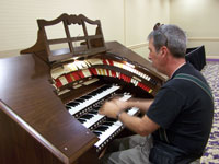 Click here to download a 2576 x 1932 JPG image portraying Tom Hoehn playng the Walker RTO'3/35 Digital Theatre Organ.